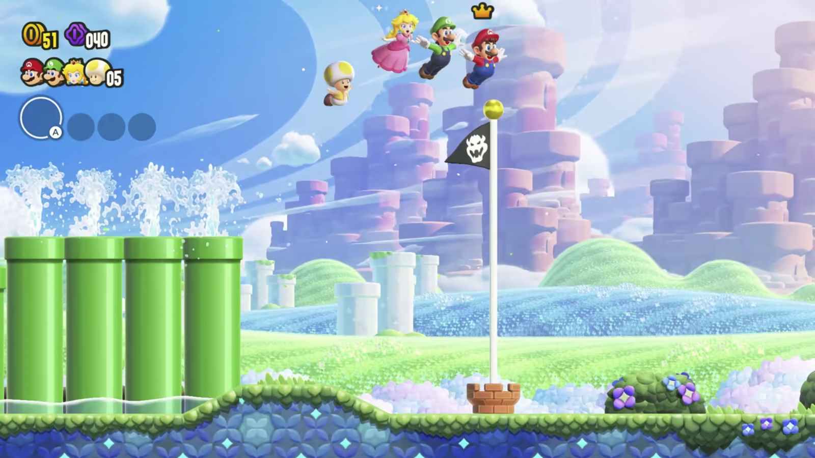 Yellow Toad, Peach, Luigi und Mario fliegen in Super Mario Bros. Wonder über die Flagge